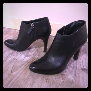 Black leather booties.